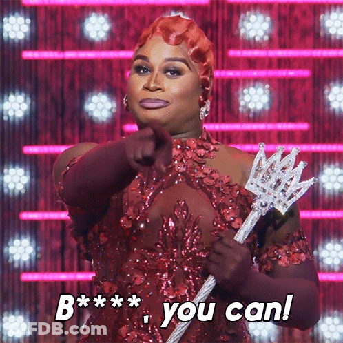 Drag Queen In Red Dress Pointing With Trident GIF