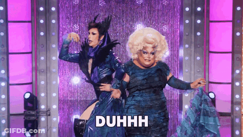 A Drag Queen Is Dancing With Another Drag Queen And The Word Duhhh Is On The Screen GIF