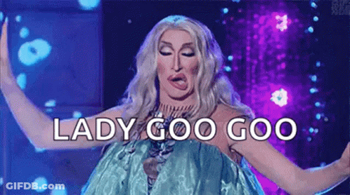 A Drag Queen Is Making A Funny Face And Saying `` Lady Goo Goo '' While Dancing On A Stage . GIF