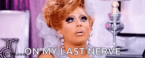 A Drag Queen Is Making A Funny Face And Saying `` On My Last Nerve '' In Front Of A Lamp . GIF