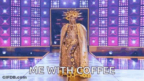 Drag Queen Walking Runway In Gold Dress And Crown GIF