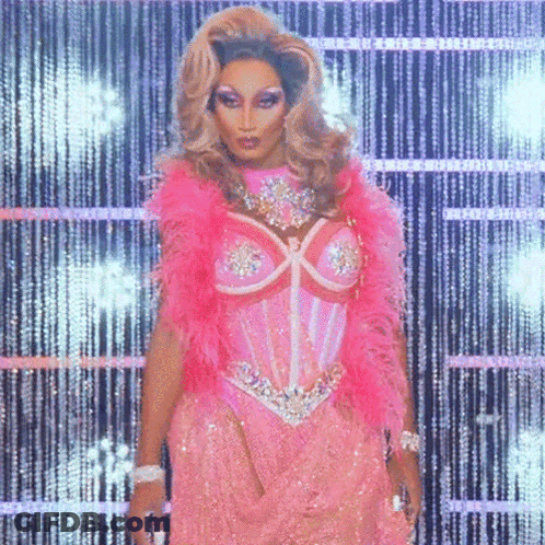 Drag Queen Wearing Pink Corset And Feather Boa GIF