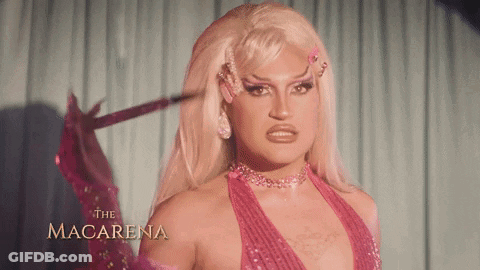 Drag Queen Macarena In Pink Dress With Sword GIF
