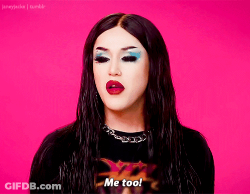 A Drag Queen Says Me Too In A Pink Background GIF