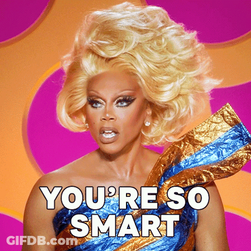 A Drag Queen Says " You 'Re So Smart " In Front Of A Purple Background GIF