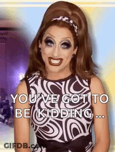 A Drag Queen Wearing A Black And White Dress Is Smiling And Says `` You 'Ve Got To Be Kidding ... '' GIF