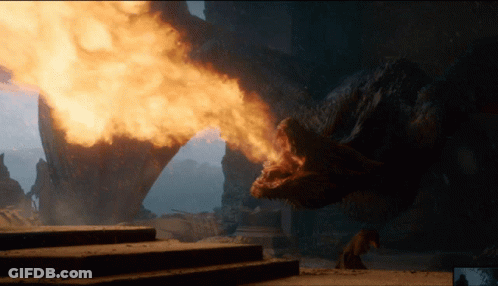 A Dragon Is Breathing Fire From Its Mouth GIF