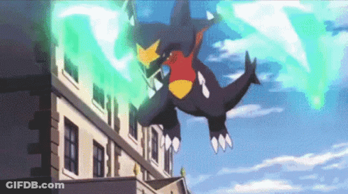 A Dragon Is Flying Over A Building With A Green Light Behind It . GIF