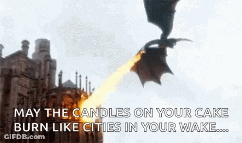 A Dragon Is Flying Over A Building With Flames Coming Out Of Its Mouth . GIF