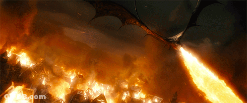 A Dragon Is Flying Over A Burning City With Flames Coming Out Of Its Mouth GIF