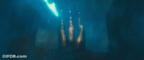 A Dragon Is Flying Over A City With A Sign That Says ' A ' On It GIF