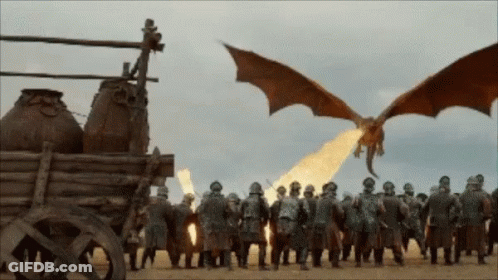 A Dragon Is Flying Over A Group Of Men GIF