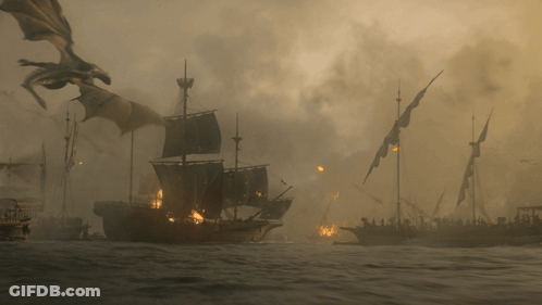 A Dragon Is Flying Over A Large Ship In The Middle Of The Ocean GIF