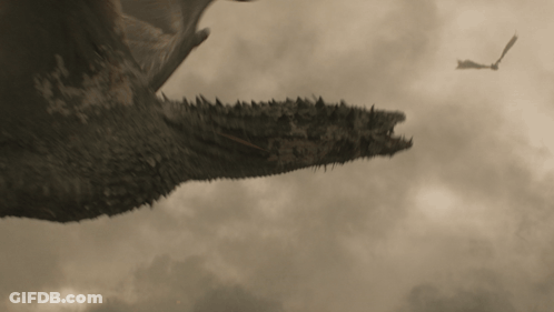 A Dragon Is Flying Through A Cloudy Sky With Another Dragon Flying In The Background GIF