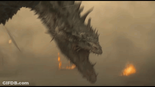 A Dragon Is Flying Through The Air With A Fire In The Background GIF