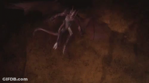 A Dragon Is Flying Through The Air With A Green Light Coming From Its Mouth . GIF