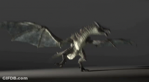 A Dragon Is Flying Through The Air With Its Wings Spread GIF