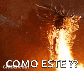 A Dragon With Flames Coming Out Of Its Mouth And The Words `` Como Este ? '' Written Below It . GIF