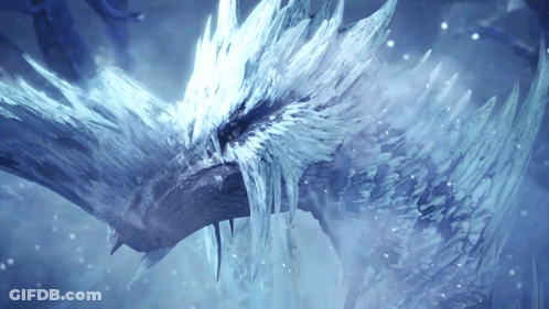 A Dragon With Ice Coming Out Of Its Mouth And Wings GIF