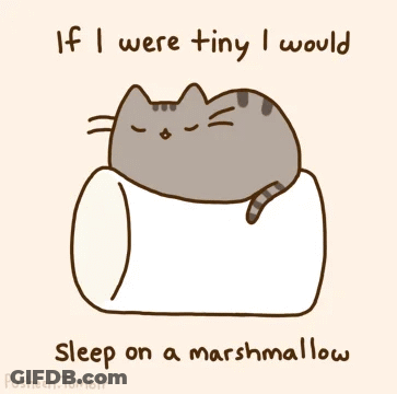 A Drawing Of A Cat Sleeping On A Marshmallow GIF