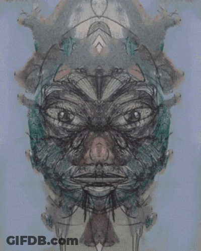 A Drawing Of A Man 'S Face With A Strange Looking Face GIF