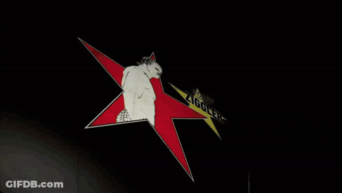 A Drawing Of A Man Standing In Front Of A Star That Says " Ziggler " GIF