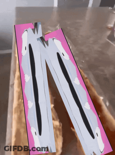 A Drawing Of A Person 'S Legs With A Pink And White Background GIF