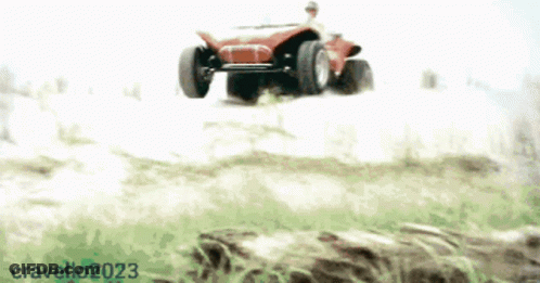 A Drawing Of A Red Vehicle With The Year 2023 On The Bottom Right GIF