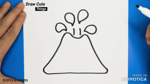 A Drawing Of A Volcano Is Being Drawn On A Piece Of Paper GIF