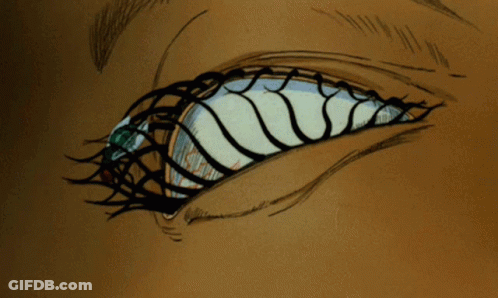 A Drawing Of A Woman 'S Eye With A Green Reflection GIF