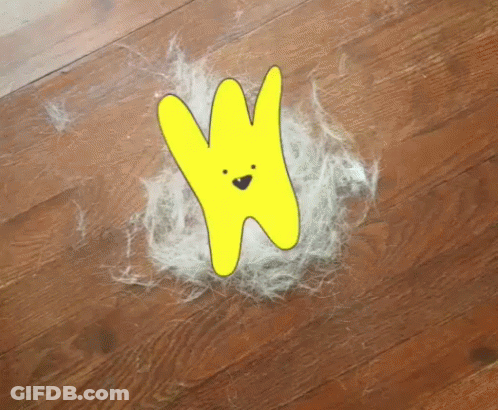 A Drawing Of A Yellow Bunny With A Face Is On The Floor GIF