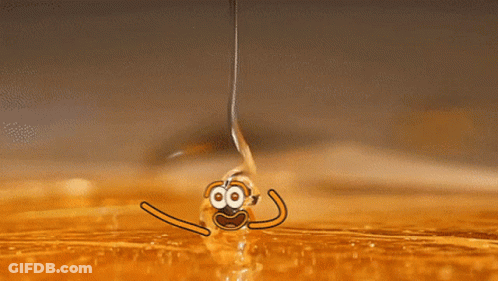 A Drop Of Liquid Is Being Poured Into A Container GIF
