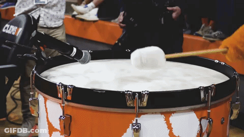 A Drum With A Microphone Attached To It That Says Clens GIF
