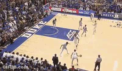 A Duke Basketball Game Is Being Played In Front Of A Huge Crowd GIF