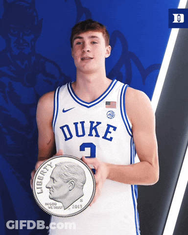 A Duke Basketball Player Holds A Liberty Coin GIF