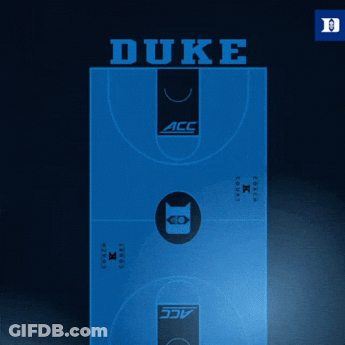 A Duke Poster With A Man In A Suit And Medal GIF
