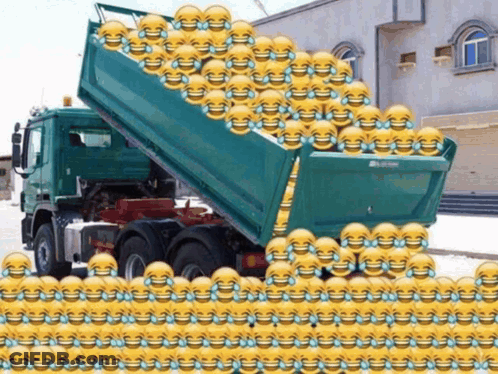 A Dump Truck Is Filled With Smiley Faces And Tears Of Laughter GIF