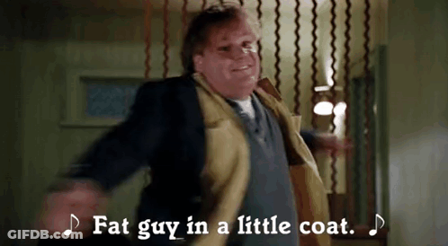 A Fat Guy In A Little Coat Is Dancing In A Room . GIF