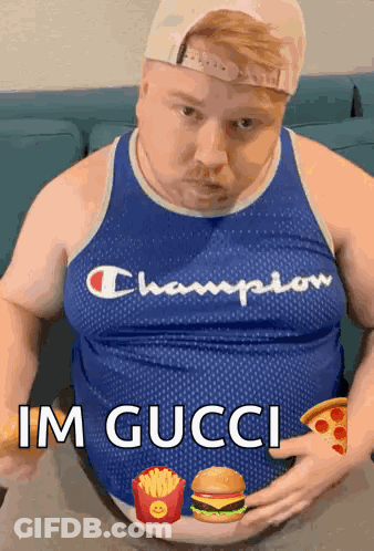 A Fat Man Wearing A Champion Tank Top Is Holding His Belly .. GIF