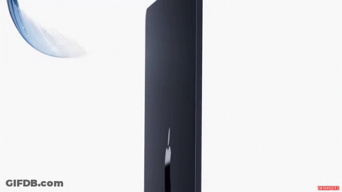 A Feather Is Flying In The Air Next To A Black Box With The Apple Logo On It GIF