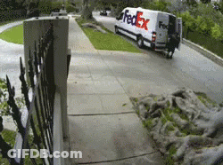 A Fedex Van Is Parked On The Side Of A Street GIF