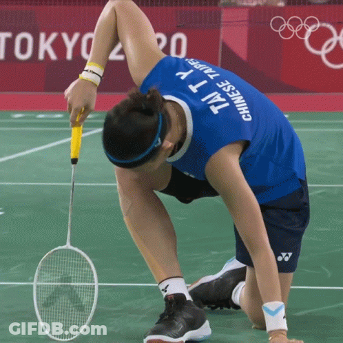 A Female Badminton Player With Tai Y On The Back Of Her Jersey GIF