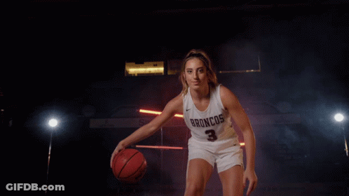 A Female Basketball Player For The Broncos Is Dribbling A Basketball GIF