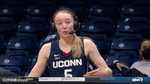 A Female Basketball Player From Uconn Is Wearing Headphones GIF