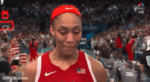 A Female Basketball Player Is Crying While Wearing A Nike Headband GIF