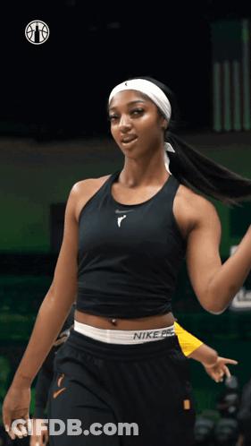 A Female Basketball Player Wearing A Black Nike Pro Tank Top GIF