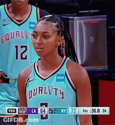 A Female Basketball Player Wearing A Blue Jersey That Says Equality GIF