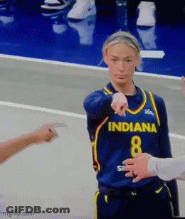 A Female Basketball Player Wearing A Blue Jersey With The Number 8 On It GIF