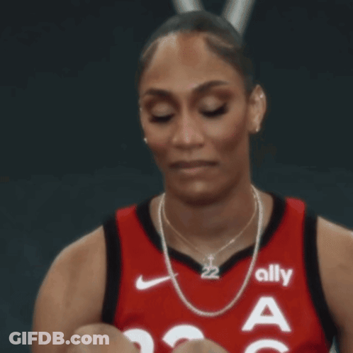 A Female Basketball Player Wearing A Jersey That Says Ally On It GIF