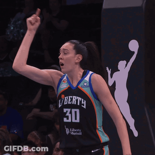 A Female Basketball Player Wearing A Jersey That Says Liberty 30 GIF